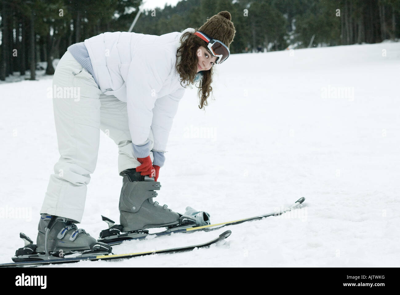 Putting ski boots on hires stock photography and images Alamy