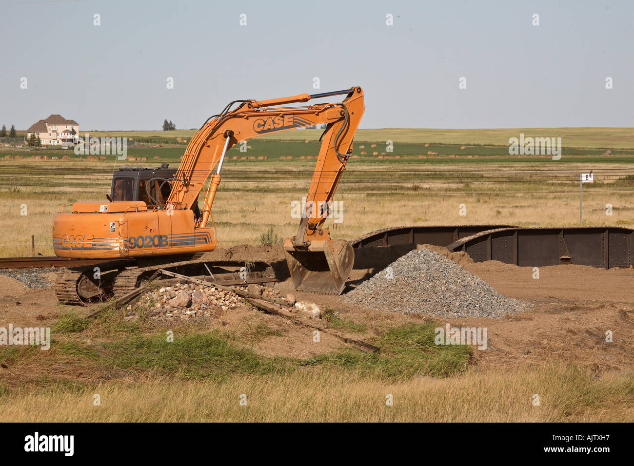 Heavy equipment working on CPR tracks at Boharme in scenic Saskatchewan