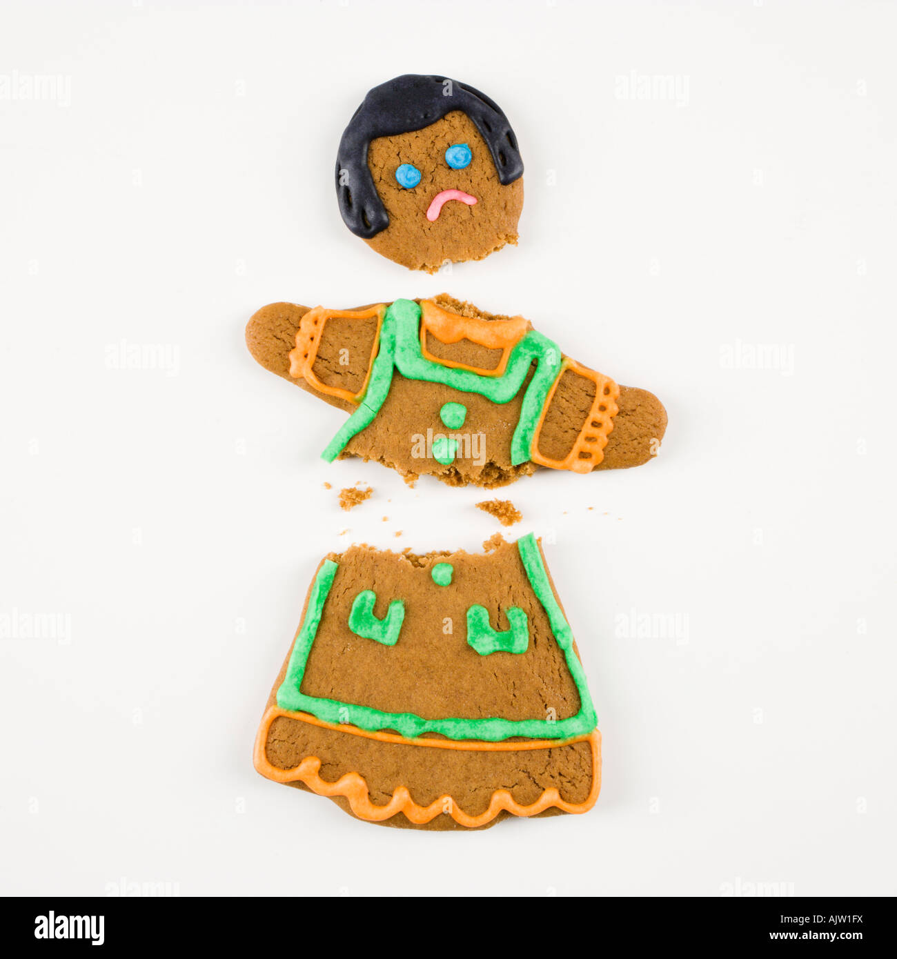 Holiday cookie gingerbread man broken hi-res stock photography and ...