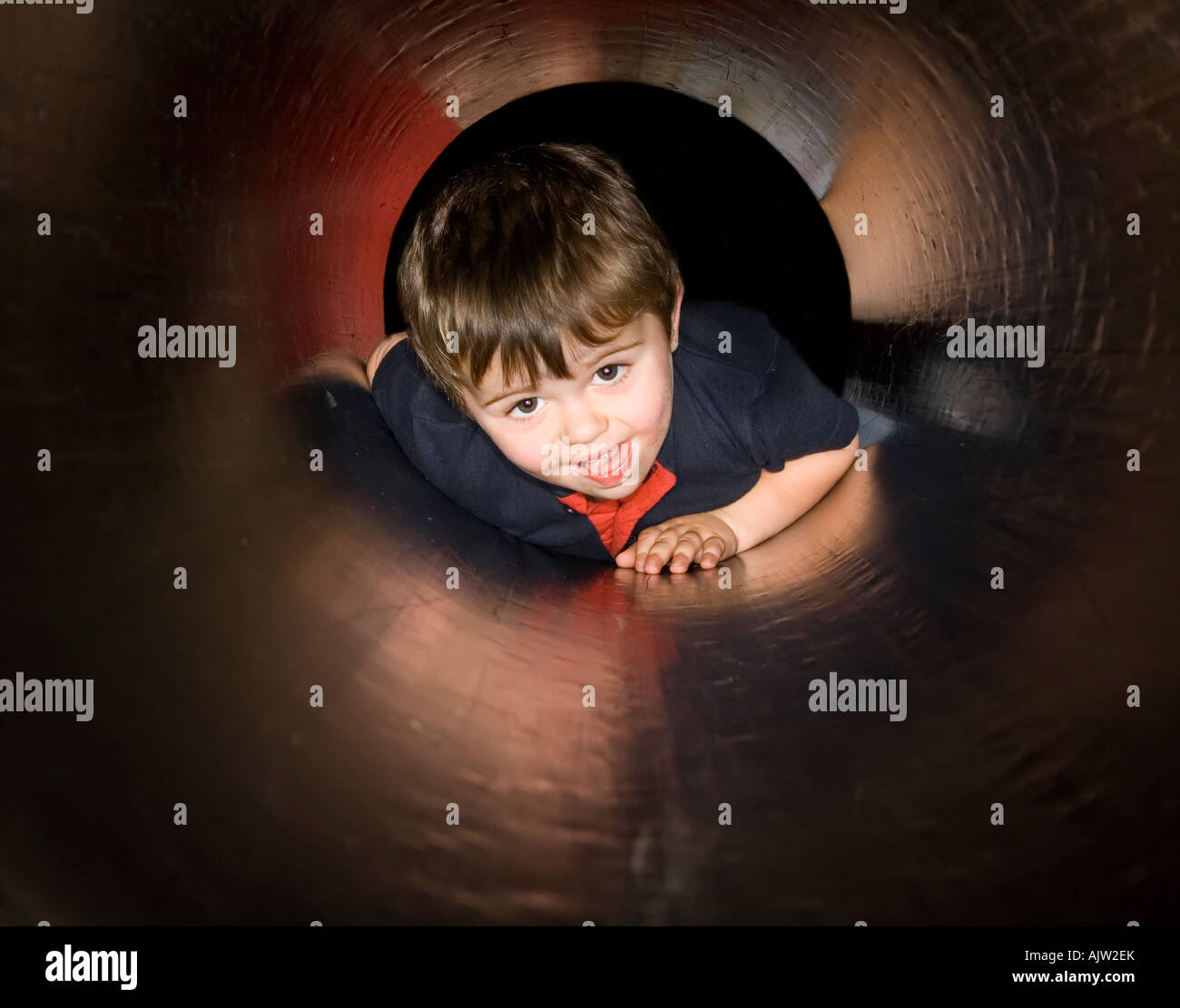 Child crawling through tunnel hires stock photography and images Alamy