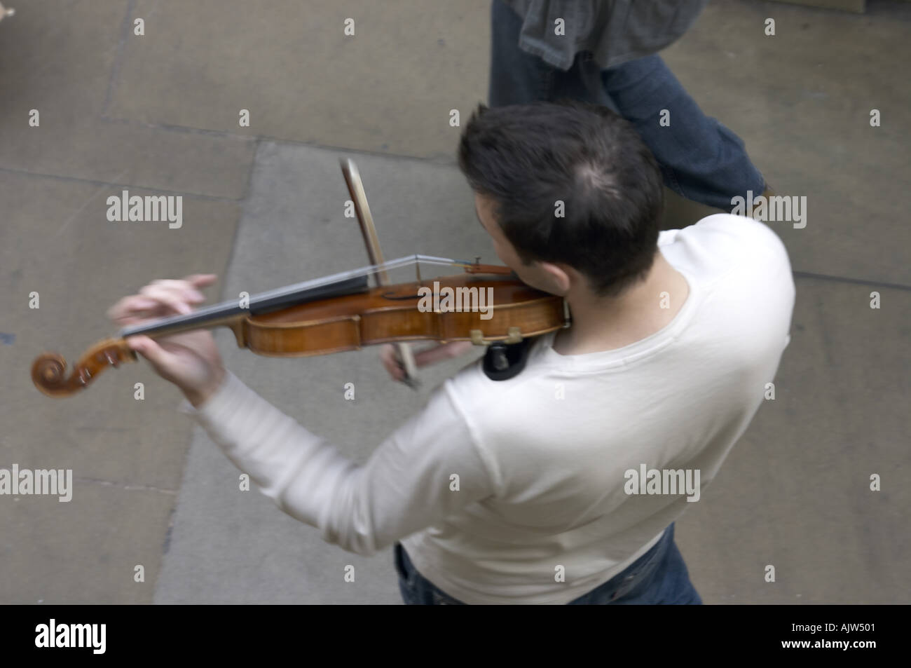 Busker musicians playing string instruments Covent Garden Market London ...