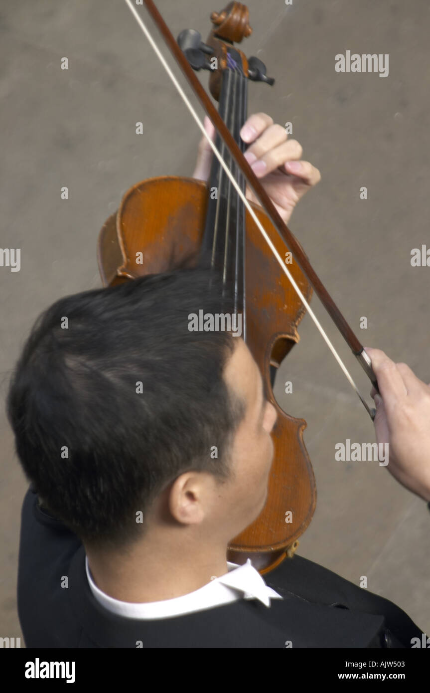 Busker musicians playing string instruments Covent Garden Market London ...
