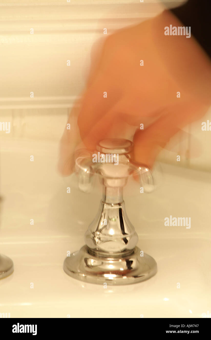 Hand Turning Tap Stock Photos & Hand Turning Tap Stock Images Alamy