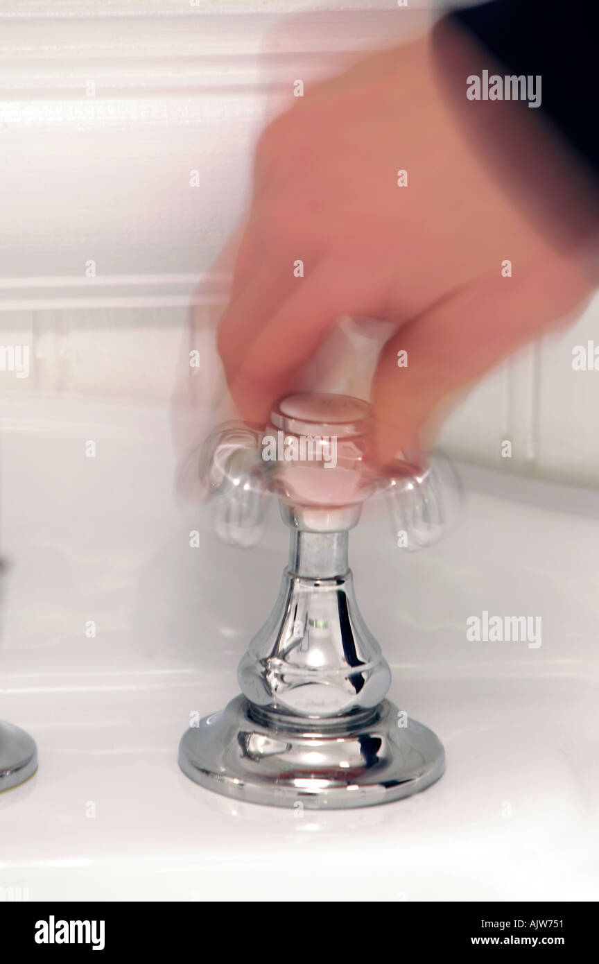 Hand Turning Tap Stock Photos & Hand Turning Tap Stock Images Alamy