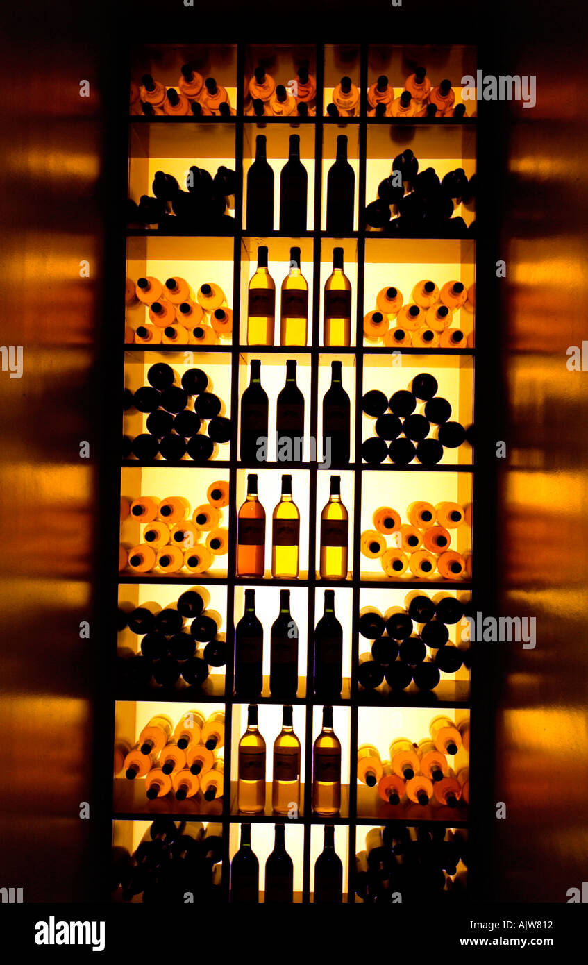 Red and white wine bottles on display Stock Photo Alamy