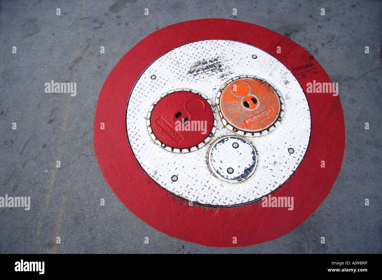 fill pipe covers for gas station storage tanks Stock Photo Alamy