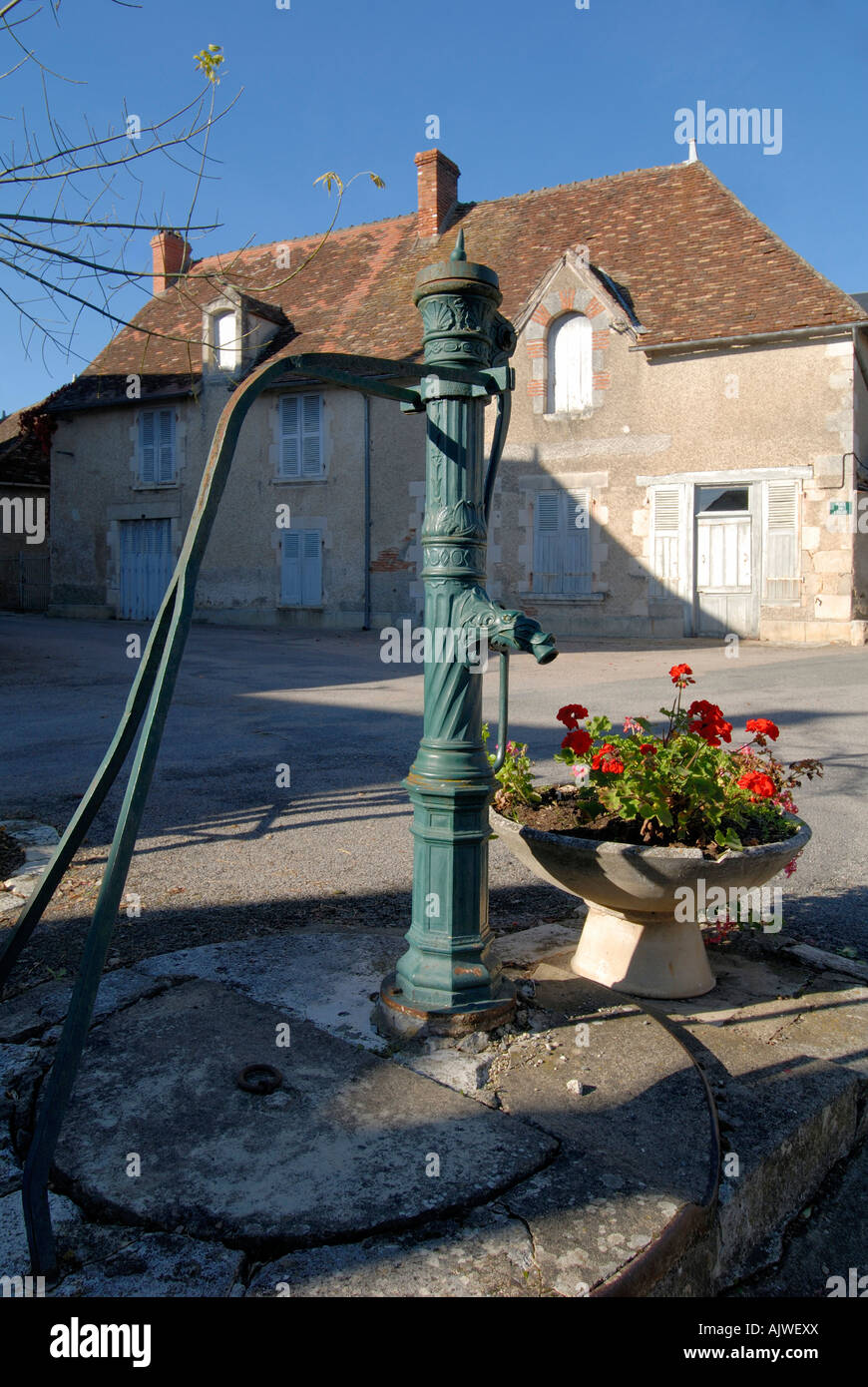 Hand-operated water pump, Ingrandes, Indre, France. Stock Photo