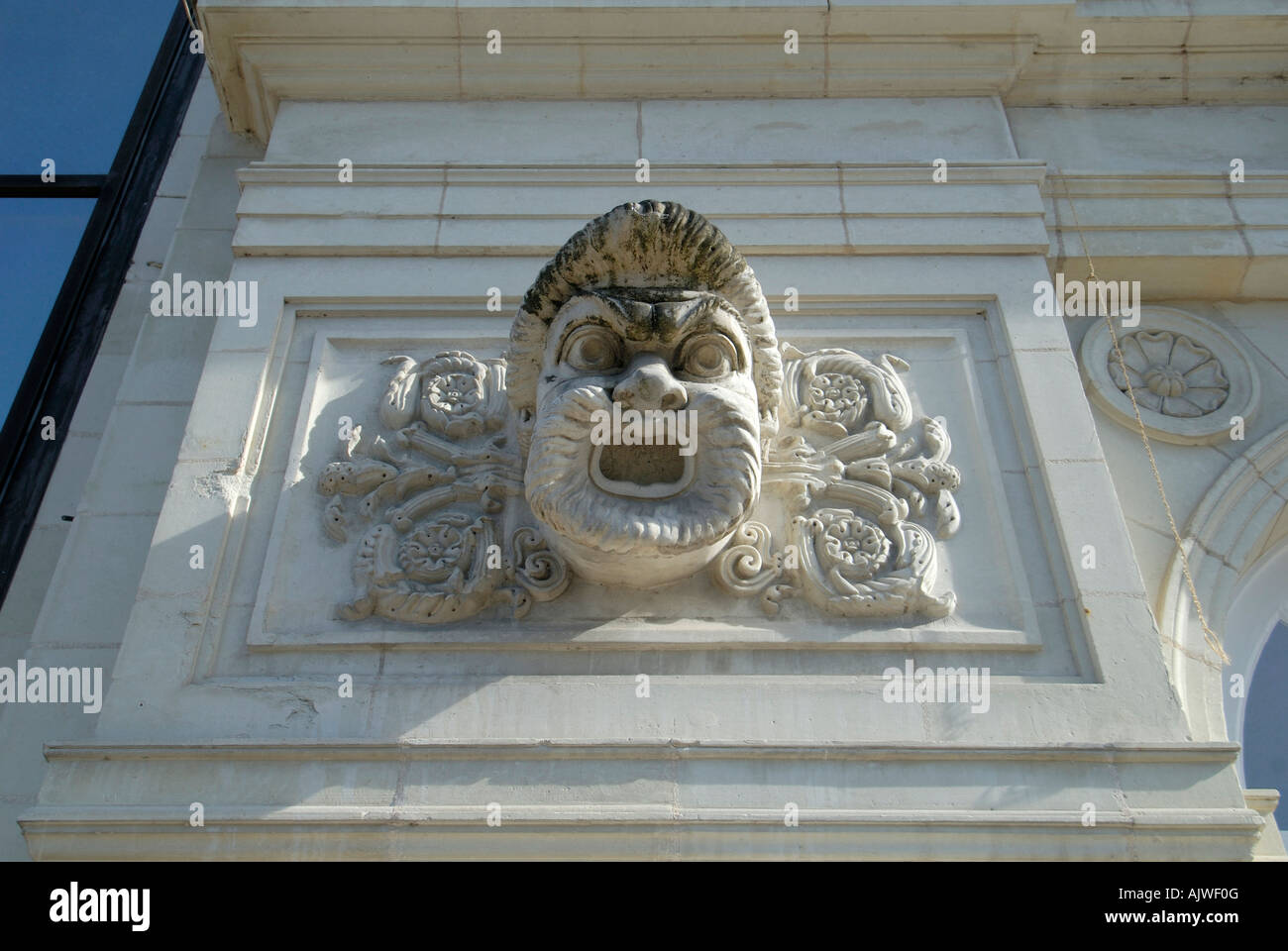 Ornate stone face in main square of Chatellerault, Vienne, France. Stock Photo