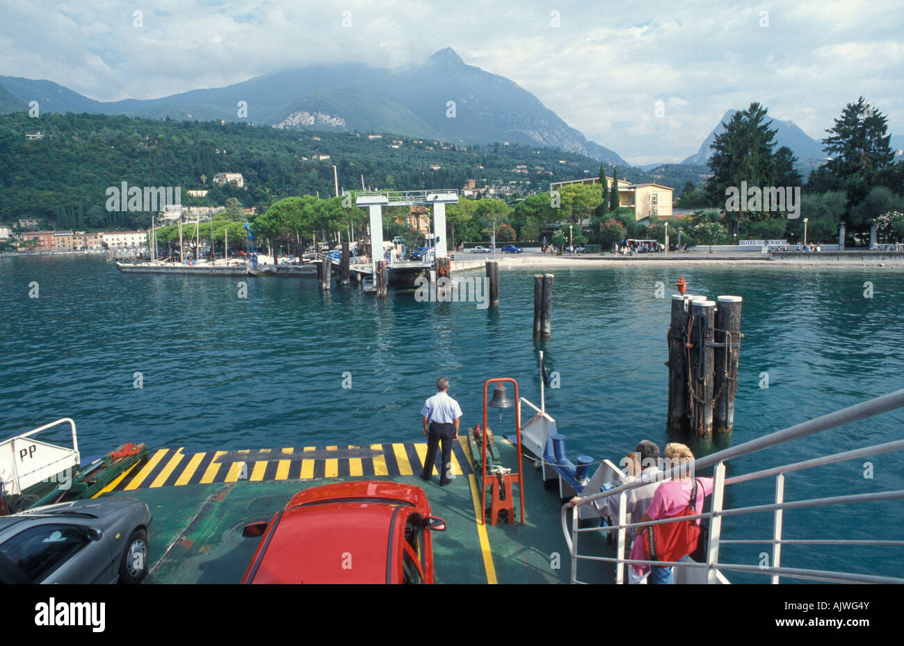 Car ferry in front of the landing stage in Toscolano Maderno Garda Lake Italy Europe Stock Photo