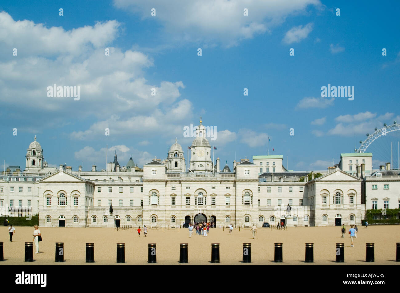 Horizontal wide angle view of Horse Guards Parade against a blue sky on a sunny day. Stock Photo
