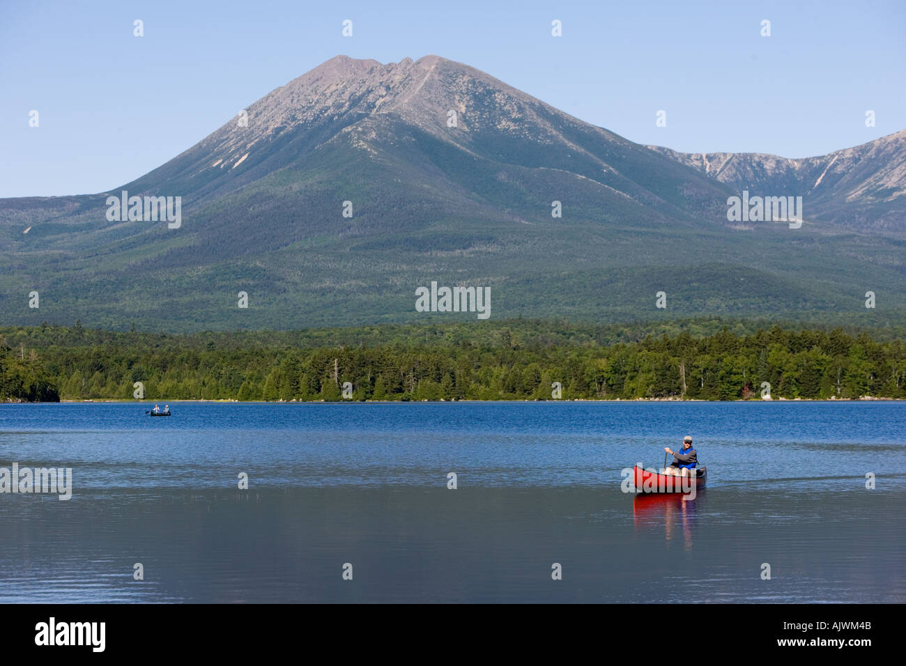 Canoeing on Maine s Katahdin Lake below Mount Katahdin the highest
