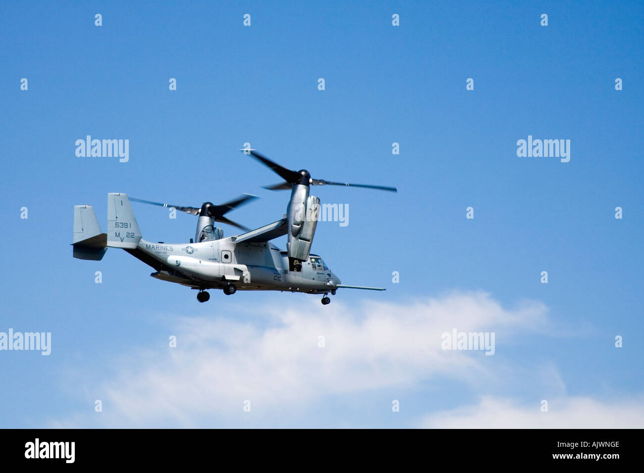 V 22 Osprey tiltrotor aircraft flying in blue skies at the RAF International Air Show in Fairford Gloucestershire in 2006 Stock Photo