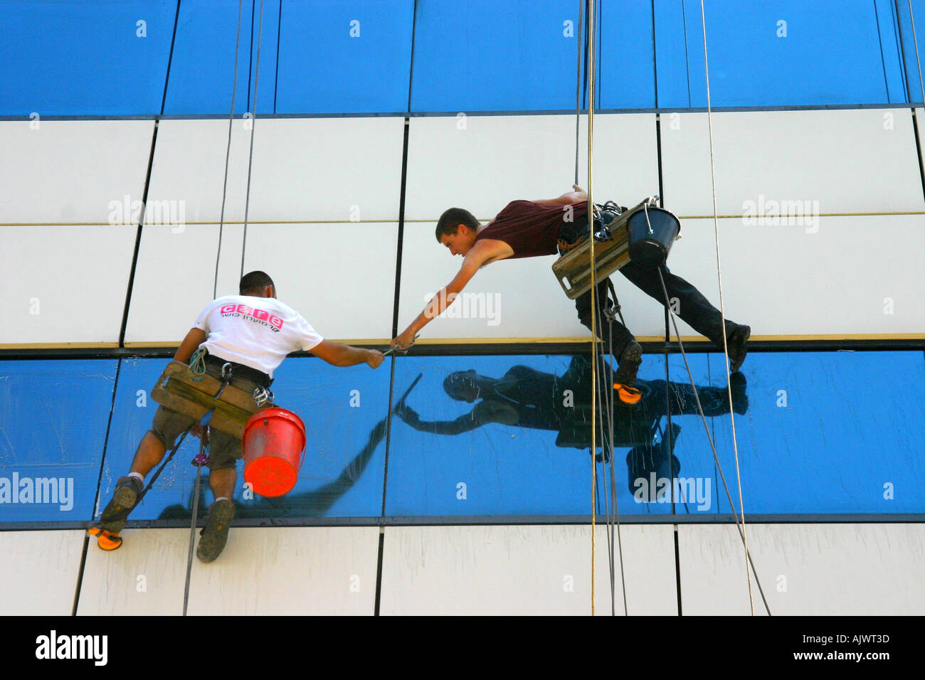 Window washers on the high bulding Stock Photo Alamy