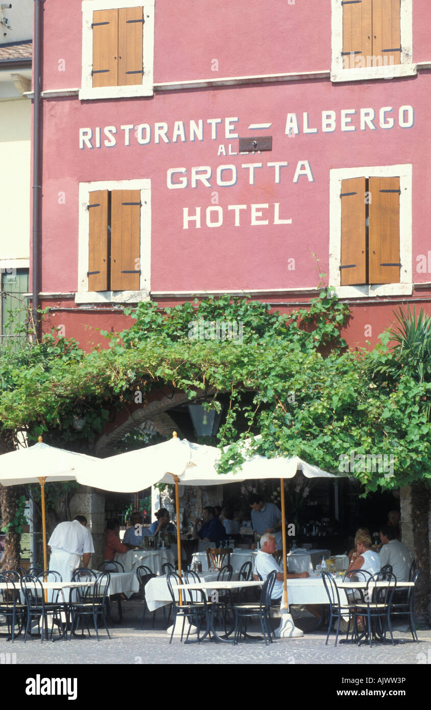 Restaurant at the harbour in Lazise Garda Lake Italy Europe Stock Photo