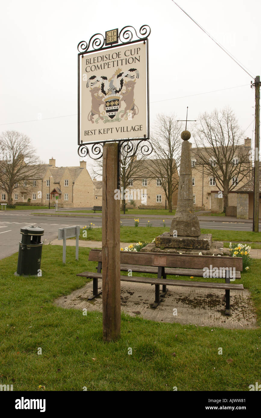 South Cerney village green and ancient cross Stock Photo Alamy