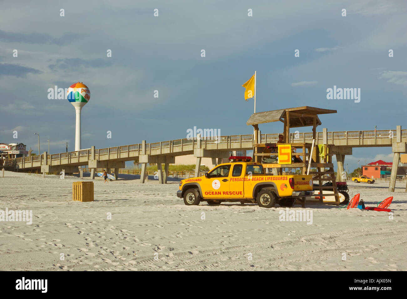Pensacola Beach with fishing pier beachball and lifeguard stand Stock Photo