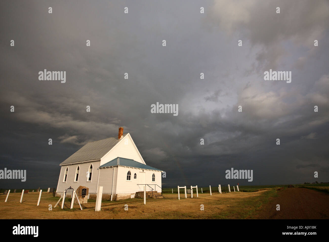 Storm clouds above a Saskatchewan country church Stock Photo - Alamy