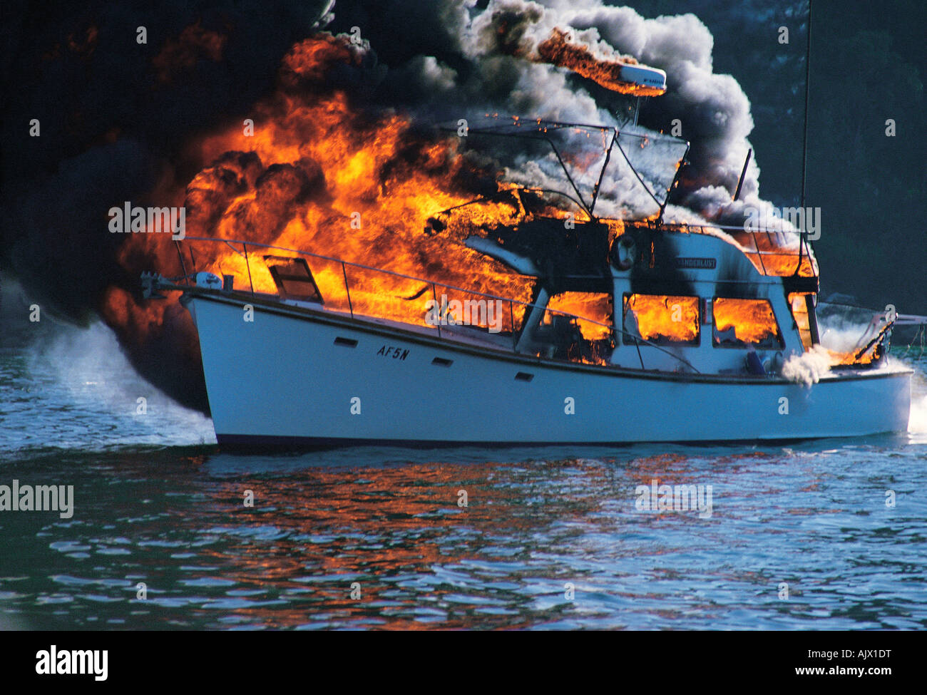 Australia. Motor yacht. Boat on fire. Stock Photo