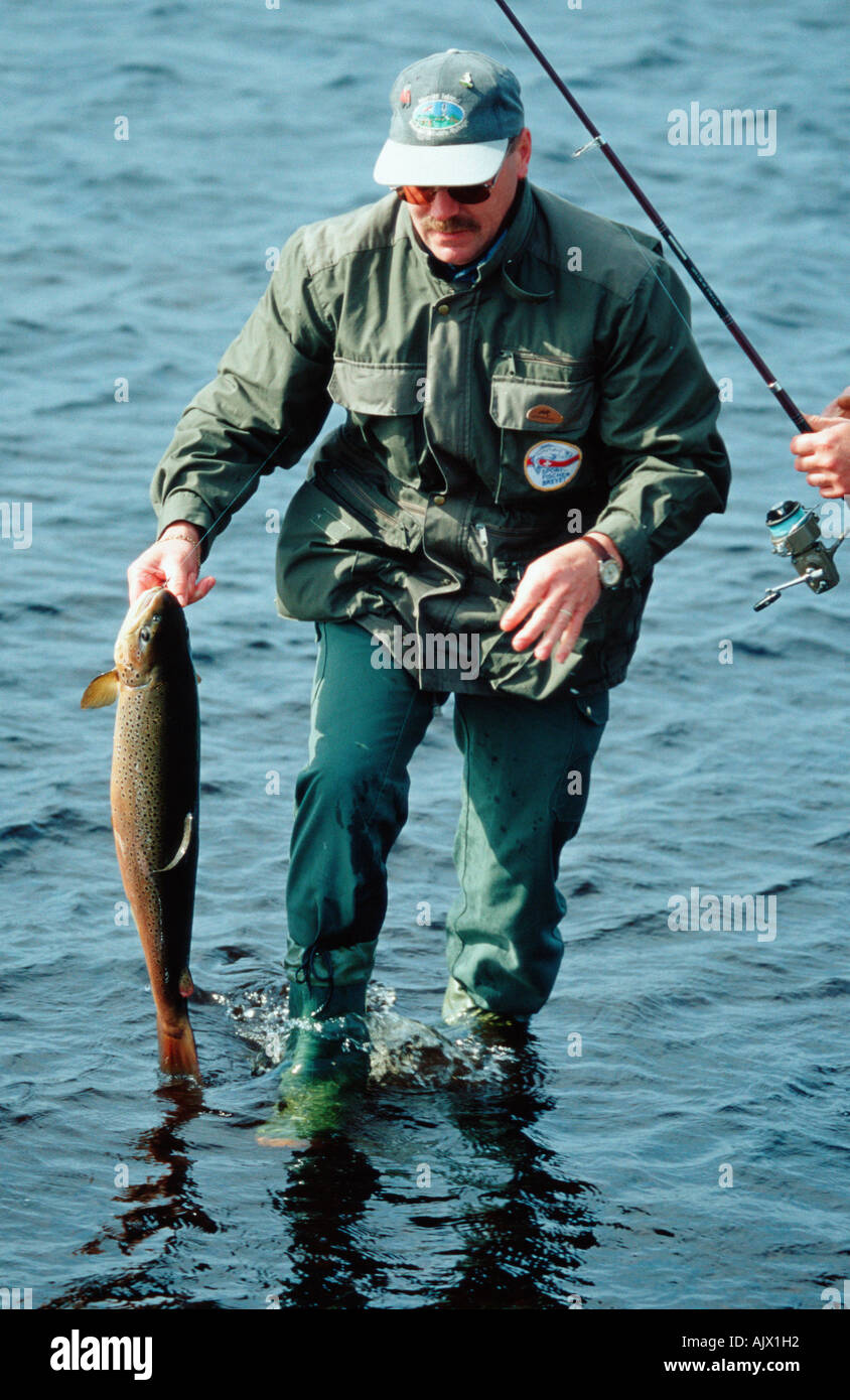 Angler with Lake Trout / Angler mit Seeforelle Stock Photo - Alamy