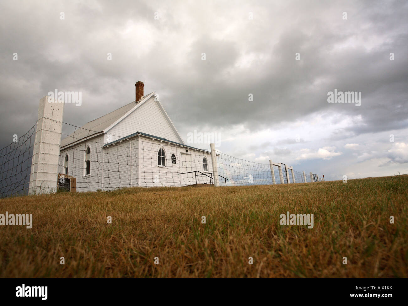 Storm clouds above a Saskatchewan country church Stock Photo - Alamy