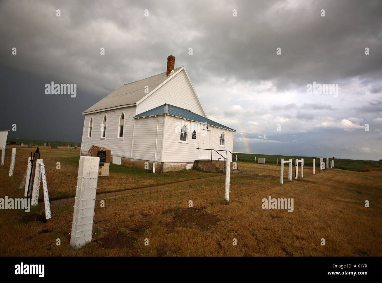 Storm clouds above a Saskatchewan country church Stock Photo - Alamy