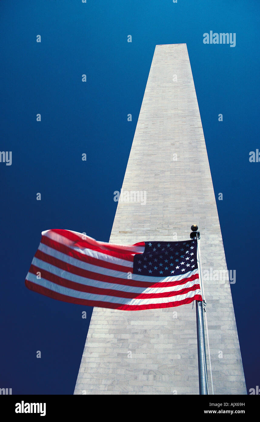 United States of America flag in front of the Washington Monument. Washington DC. Stock Photo
