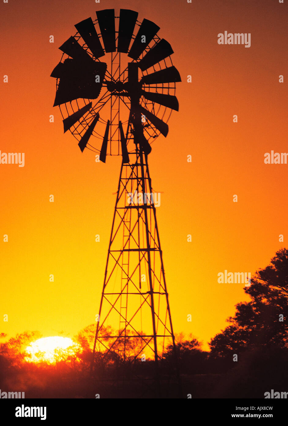 Australia. Agriculture, Windmill at sunset Stock Photo Alamy