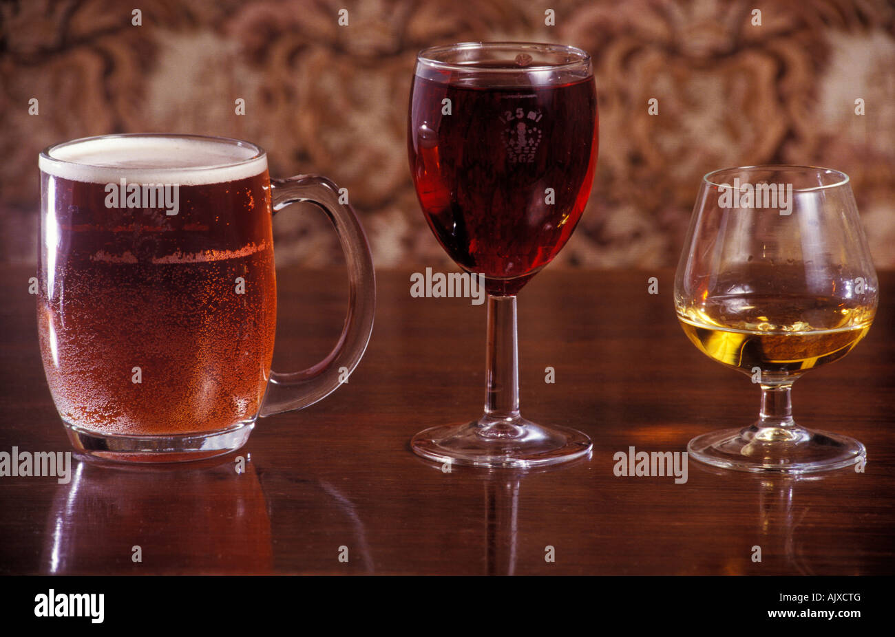 units of alcohol, pint of beer, glass of red wine, shot of whisky on pub table Stock Photo
