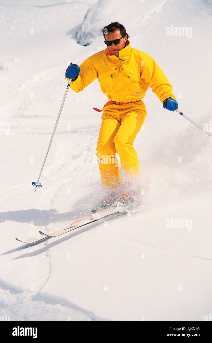 Young man downhill skiing Stock Photo Alamy