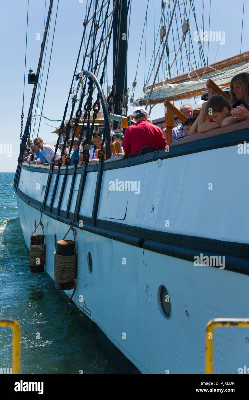 Passengers line the deck as the Empire Sandy leaves Bronte Harbour