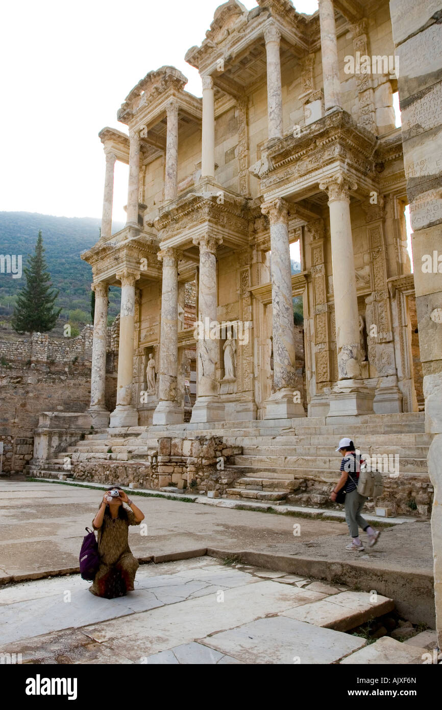 Tourist taking pictures at Celcus Library in Ephesus - the Ionian city in ancient Anatolia, now Turkey. Stock Photo