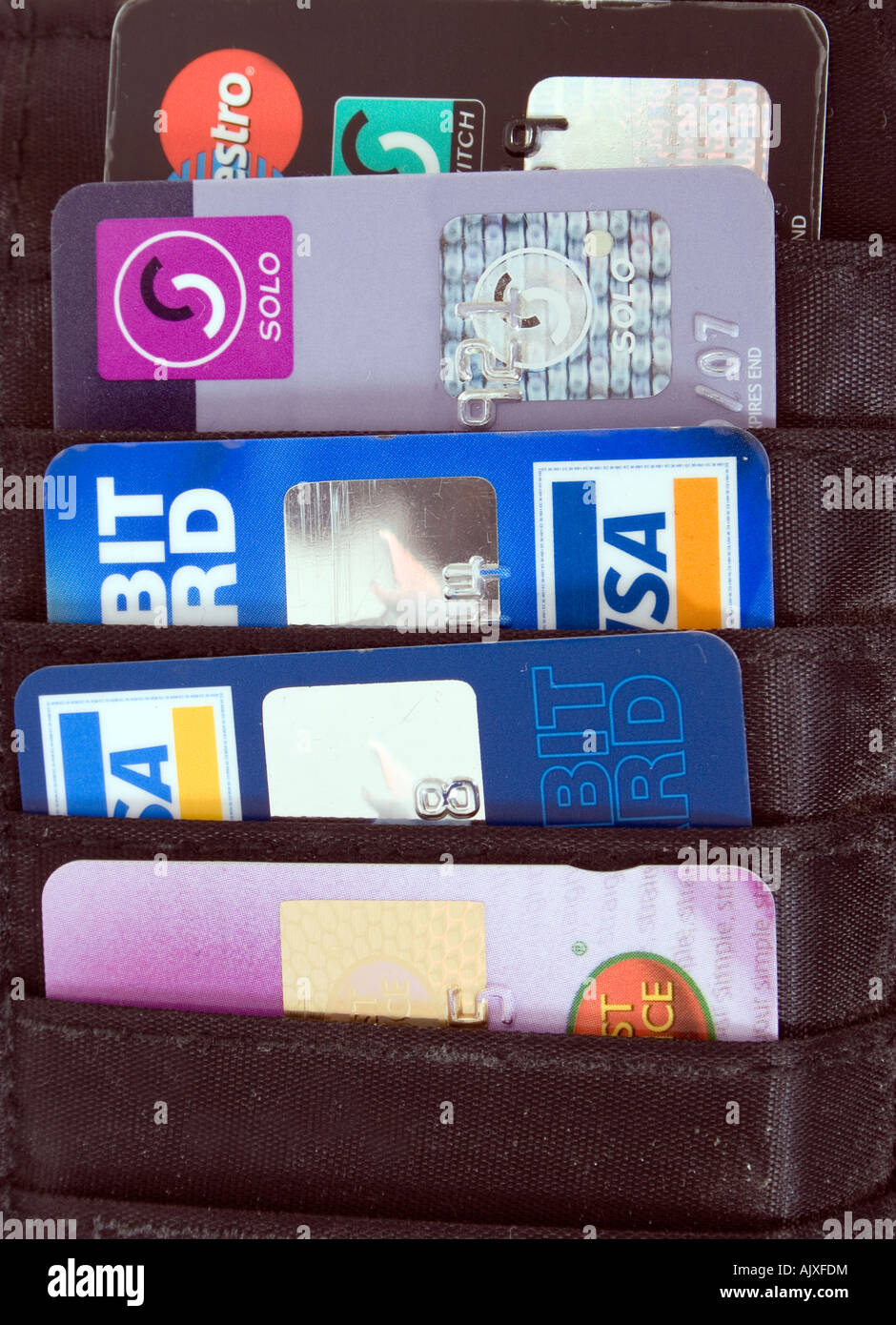selection of credit and debit cards in wallet Stock Photo