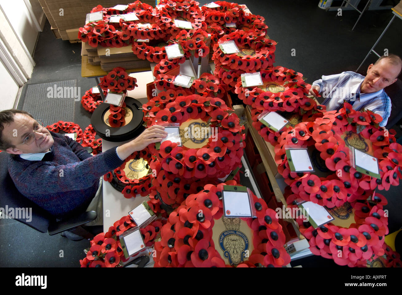 Workers at the Royal British Legion Poppy Factory in Richmond Surrey Stock Photo