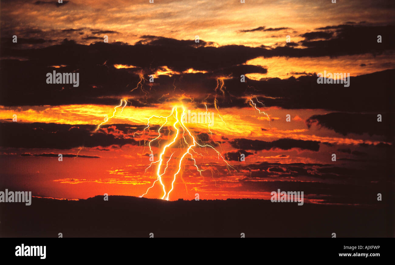 Environment & nature. Weather. Lightning at sunset over ridge. Blue Mountains. New South Wales. Australia. Stock Photo