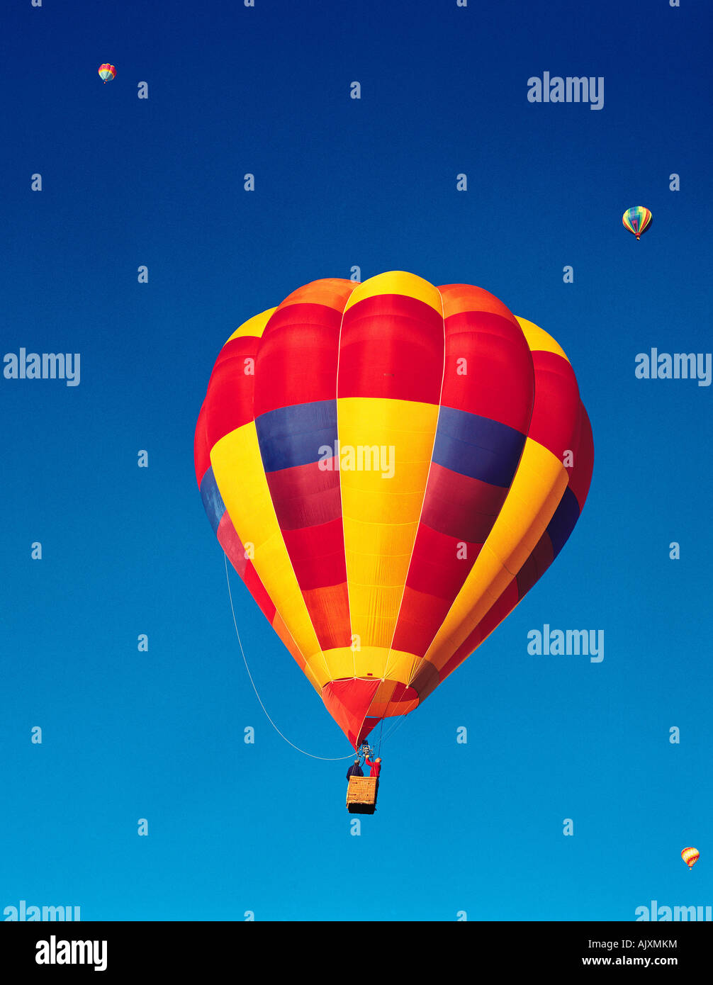 Low angle viewpoint of hot air balloons in flight. Stock Photo