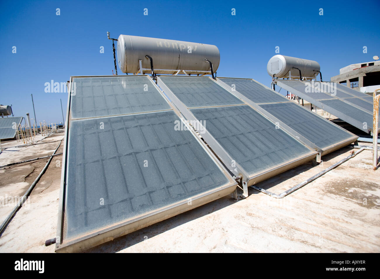Solar Water Heating Panels on Hotel Roof in Crete,Greece Stock Photo
