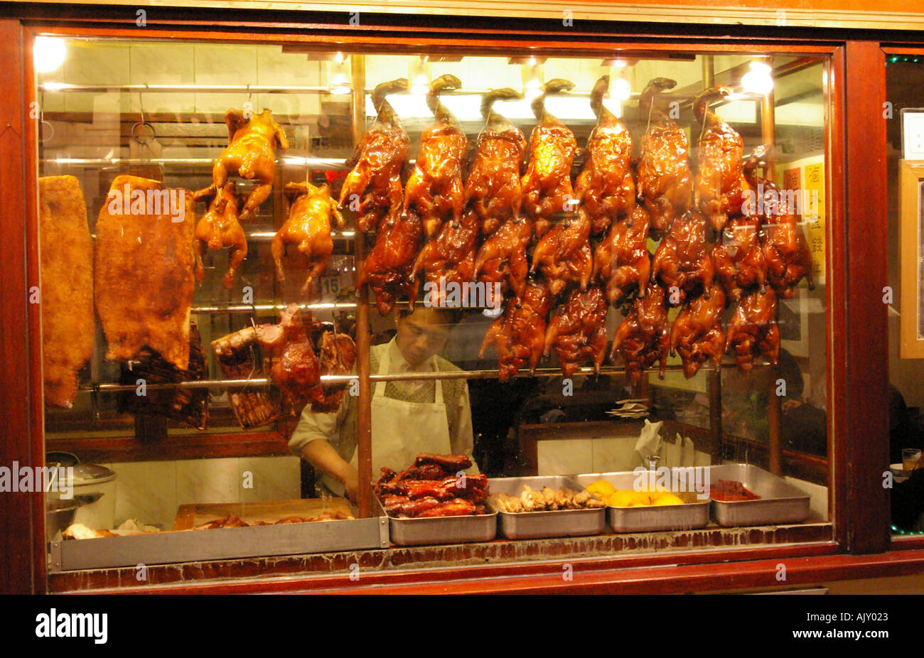 Ducks hanging in a Chinese restaurant in Gerrard Street chinatown Stock