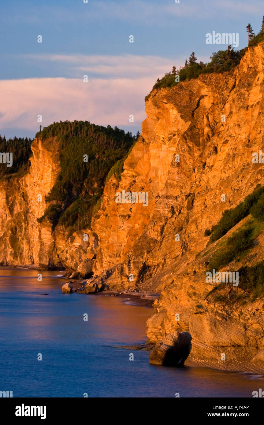 Dawn light on cliffs at Cap-Bon-Ami, Forillon National Park, QC Quebec ...