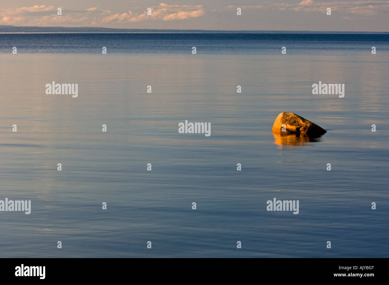 Boulder in calm Bay of Chaleur, Pokeshaw Municipal Park, Pokeshaw, NB New Brunswick, Canada