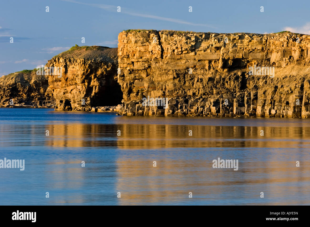 Pebble beach and cliffs along shore of Bay of Chaleur, Pokeshaw