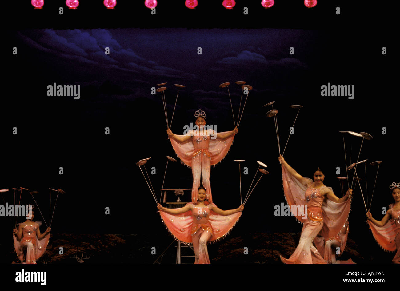 Asia, China, Beijing. Deyang Acrobatic Troupe, plate spinners (NR) Stock Photo