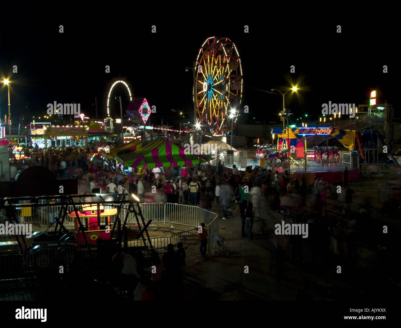Carnival rides crowd hi-res stock photography and images - Alamy