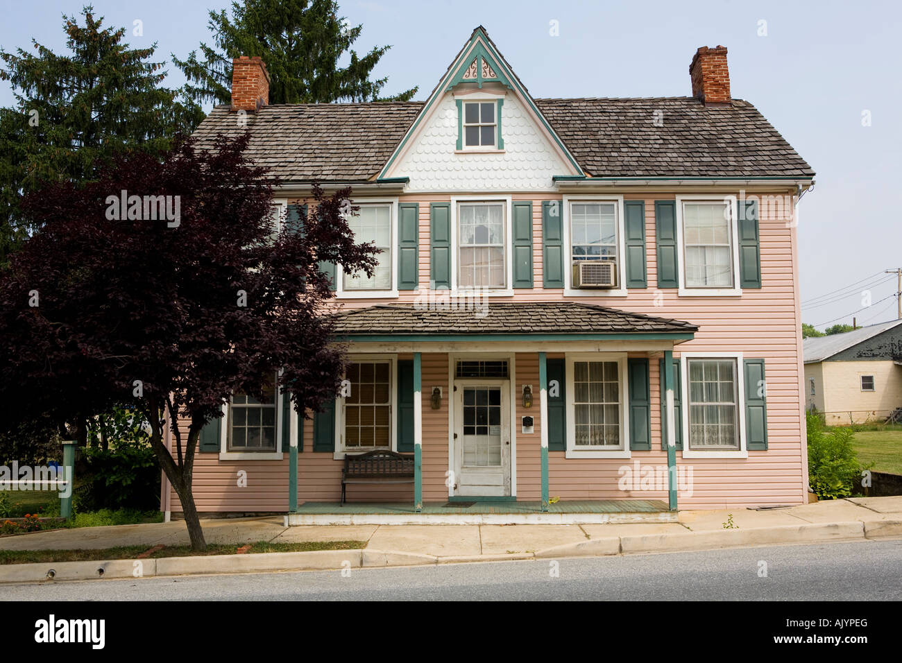 Three story pink and green vintage House in Pennsylvania Stock Photo