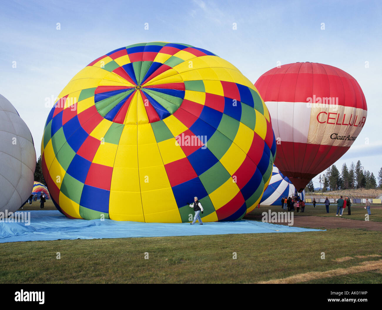 USA OREGON BEND Hot air balloons take off from a field during a summer