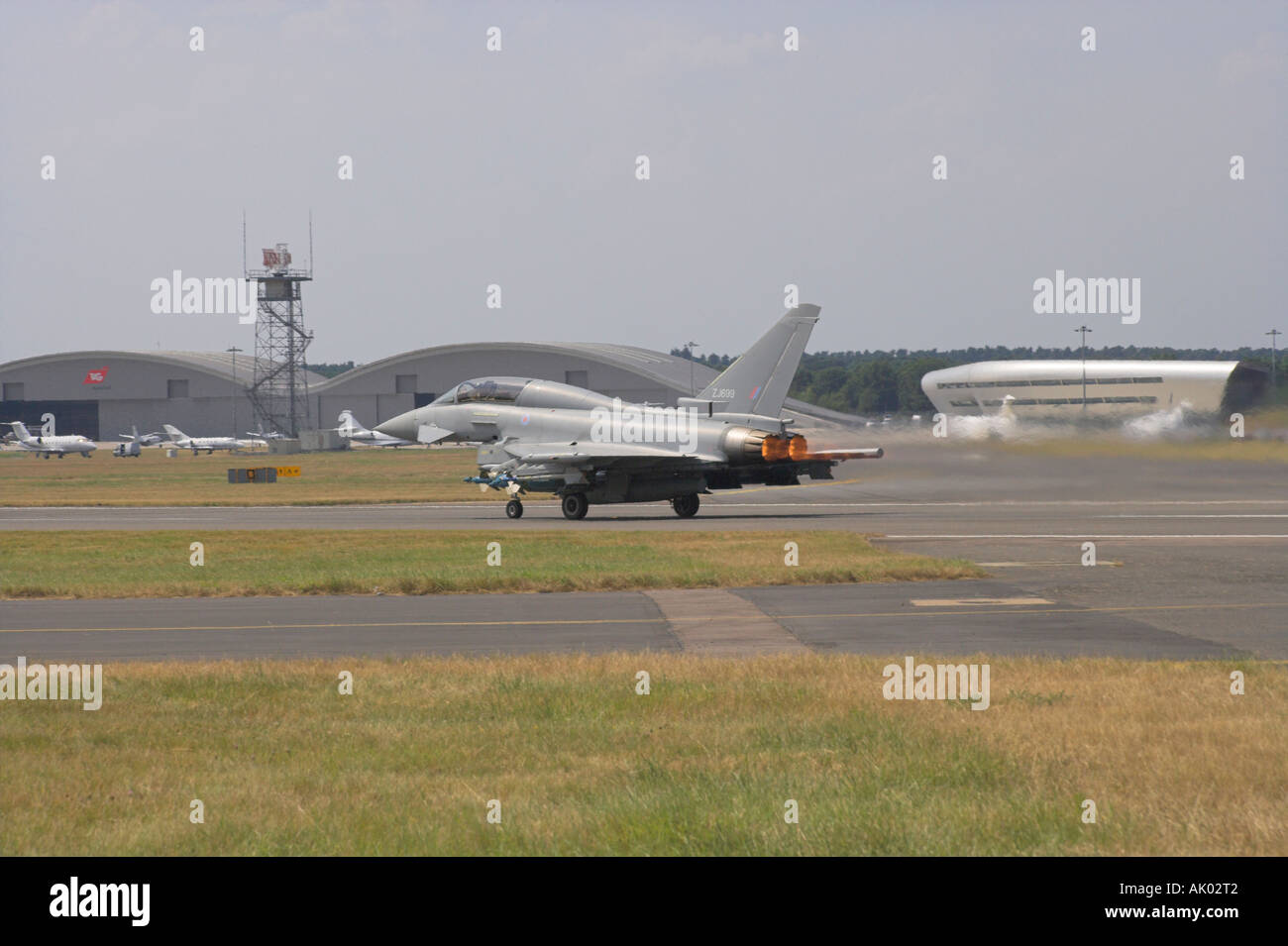 RAF Typhoon taking off run on full reheat Stock Photo