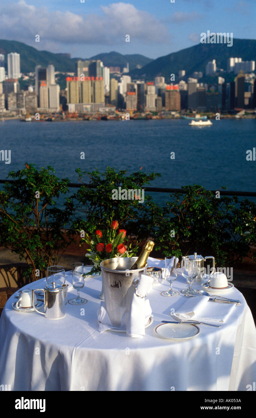 champagne bucket on laid table with view of Hong Kong Stock Photo Alamy