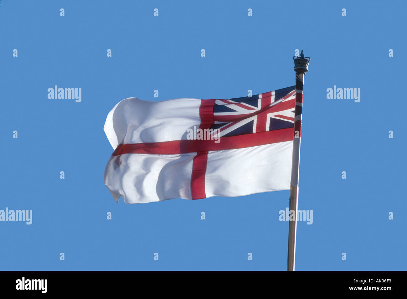 The White Ensign flies from a British Royal Navy warship London England