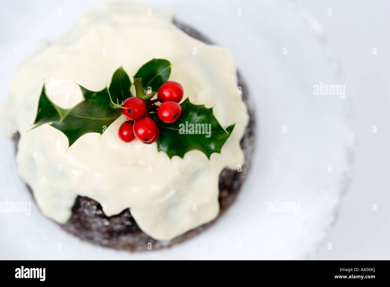 Traditional christmas pudding with brandy cream Stock Photo