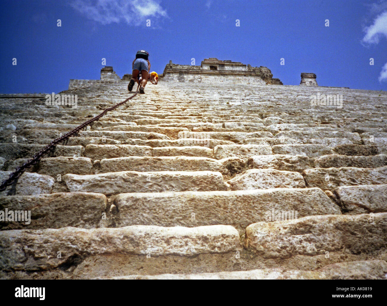 "Ascend to the sky" Steep climbing with iron chain to top of Maya stone
