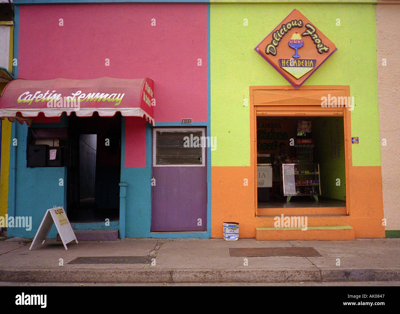 Colourful architecture & entrance doors & insignias of cafeteria & ice cream shop Merida Venezuela South Latin America Stock Photo